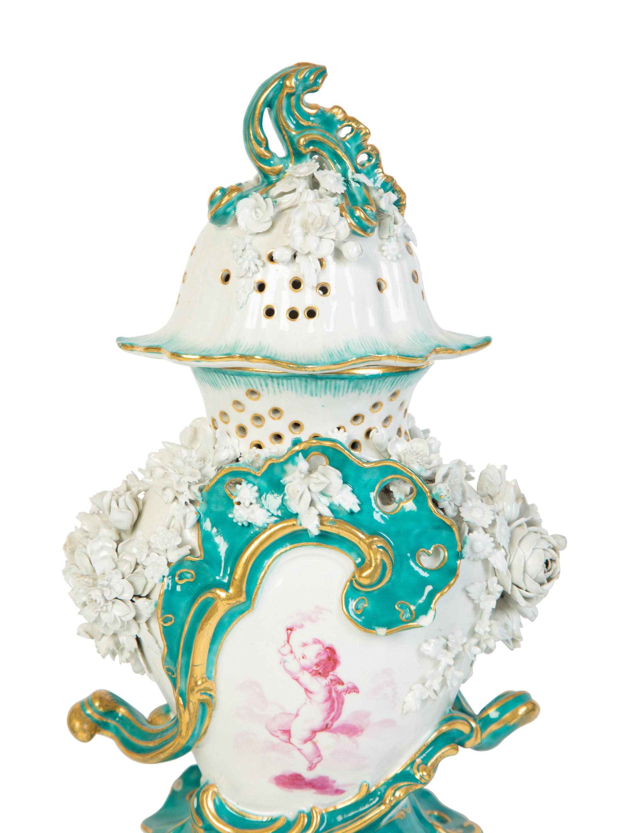 A Continental Porcelain Garniture Set — 19TH CENTURY