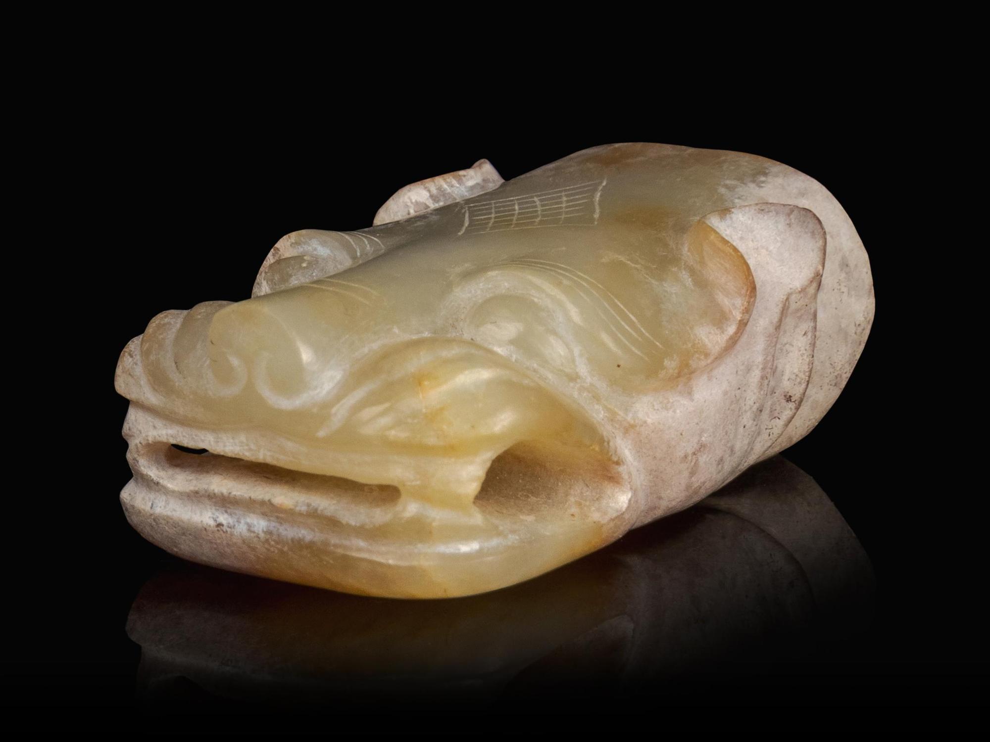 A White Jade Head of a Dragon