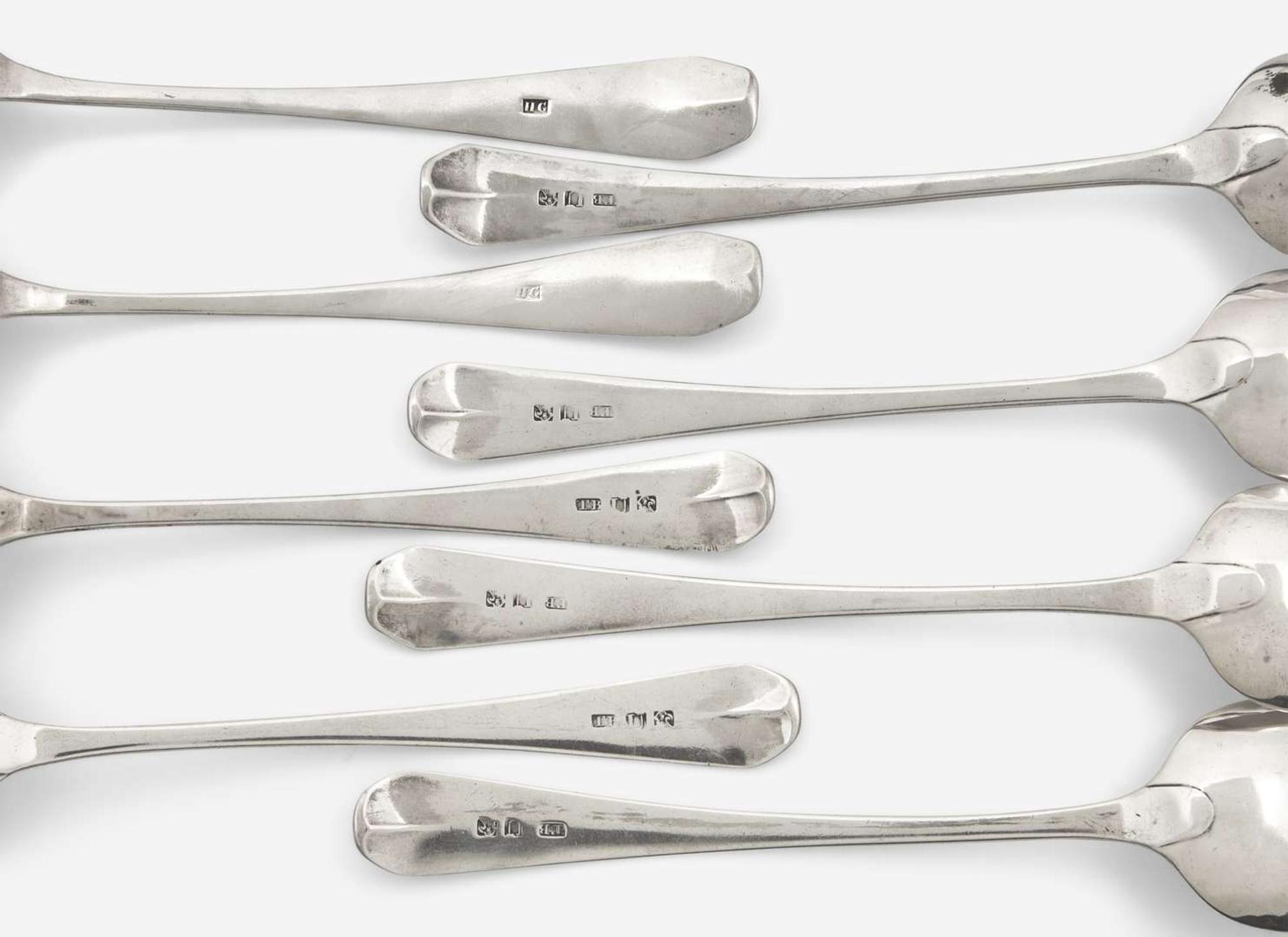 A group of eight Federal silver coffin-end tablespoons, Thomas Baker Burger (active 1805-1806), New York, NY, and maker "HG," circa 1805