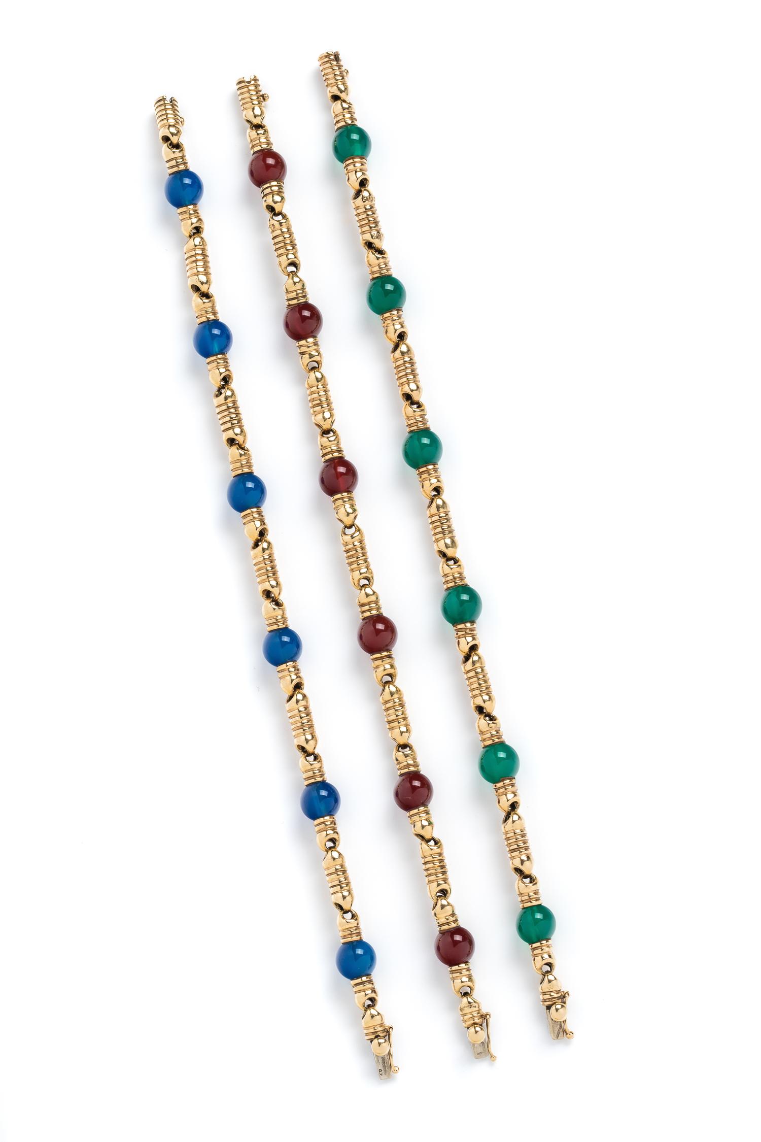 BOUCHERON, YELLOW GOLD AND HARDSTONE BRACELET SET