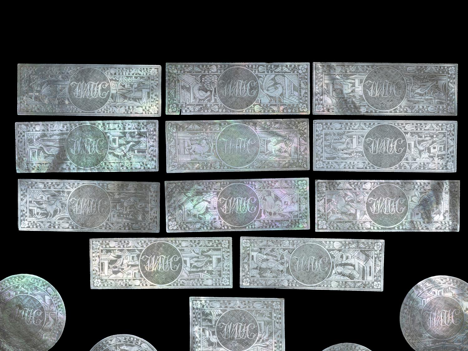 Seventeen Carved Mother-of-Pearl Game Pieces