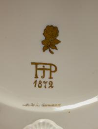 A Pair of German White Glazed Porcelain Candelabra