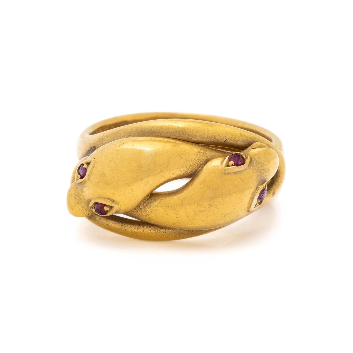 BRITISH, YELLOW GOLD AND RUBY SNAKE RING