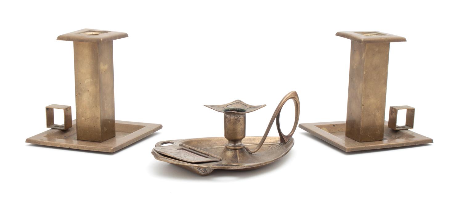 A Pair of Brass Candle Holders Height of first 4 1/2 inches.