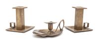 A Pair of Brass Candle Holders Height of first 4 1/2 inches.