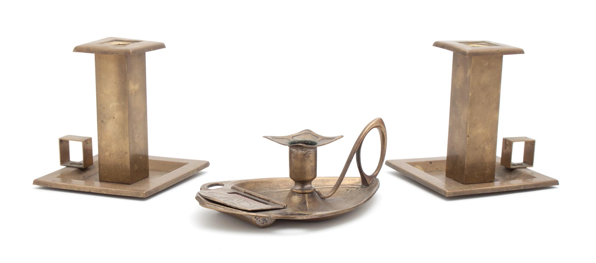 A Pair of Brass Candle Holders Height of first 4 1/2 inches.