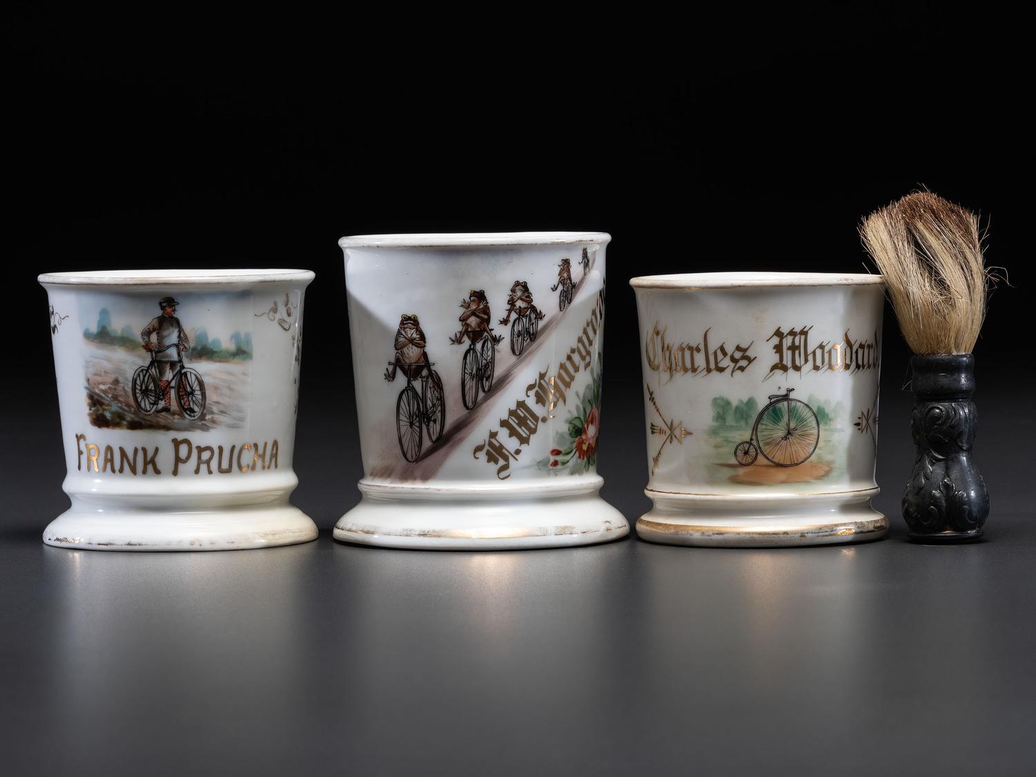 Three Cyclist's Porcelain Shaving Mugs