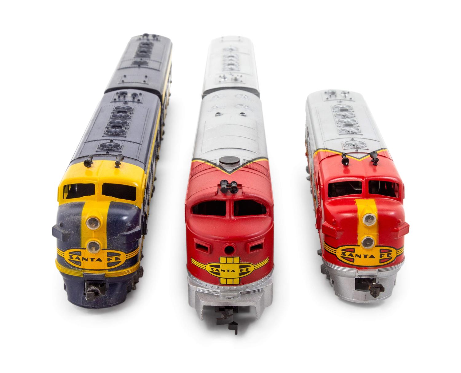 A Group of Three Polychrome HO-Gauge Santa Fe Railroad Diesel Locomotives