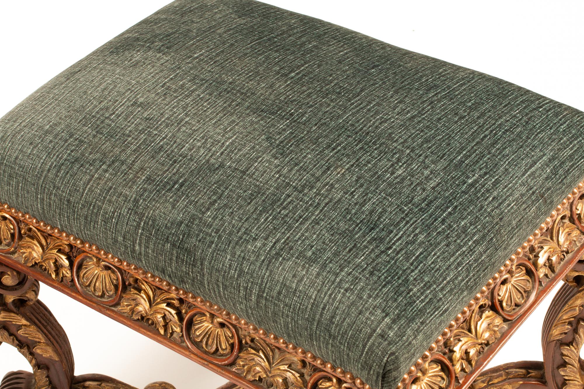 A Pair of Regence Style Parcel Gilt Benches