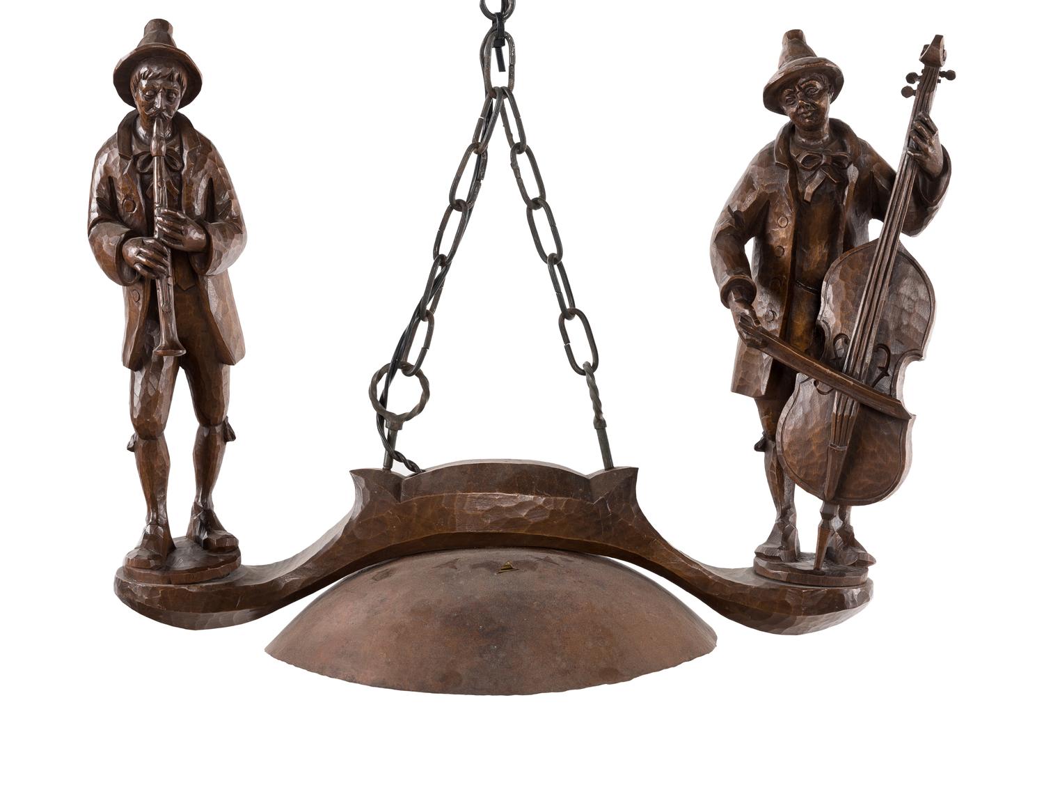 A Black Forest Carved Figural Single-Light Chandelier