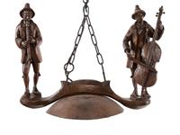 A Black Forest Carved Figural Single-Light Chandelier