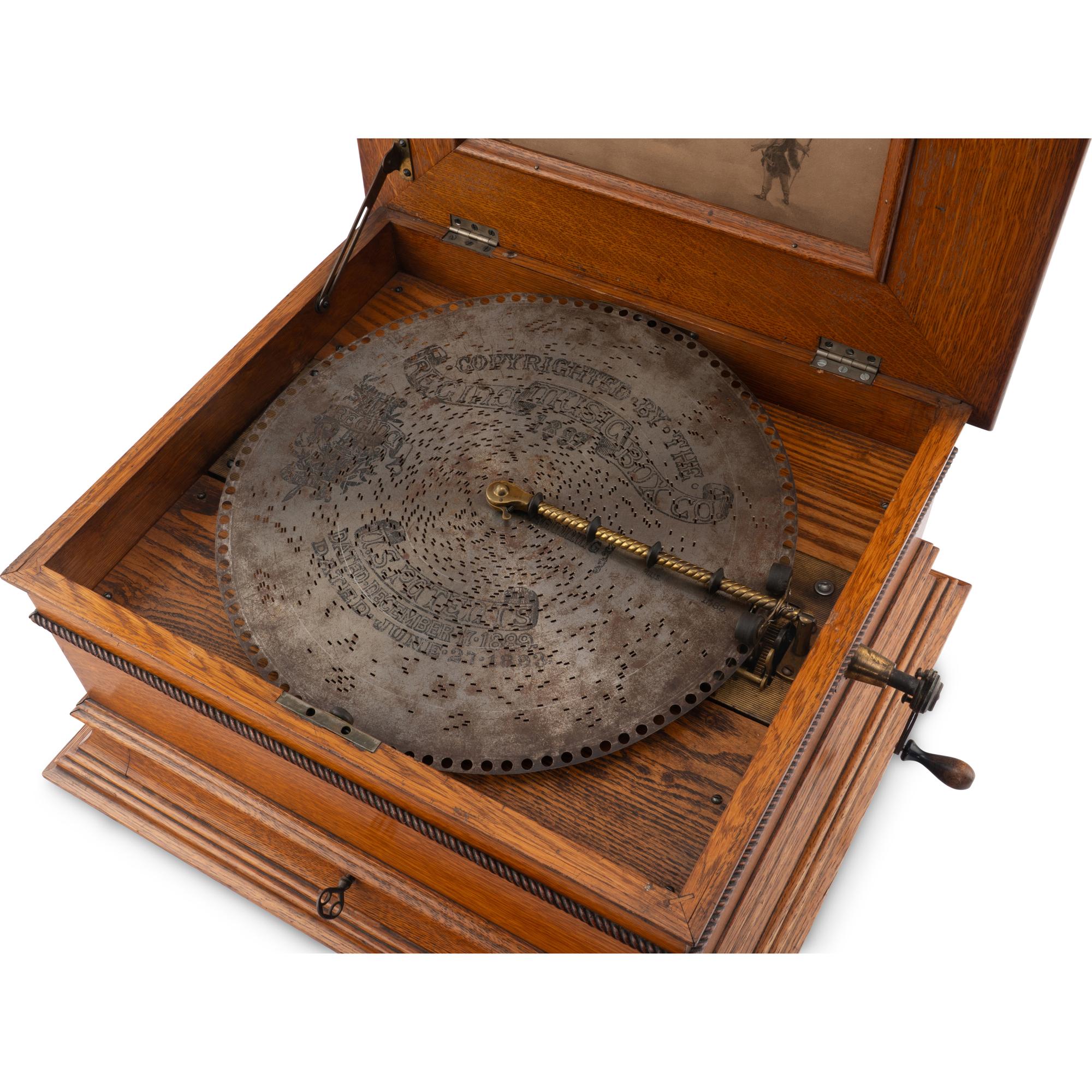 A Regina Oak Tabletop Disc Music Box
