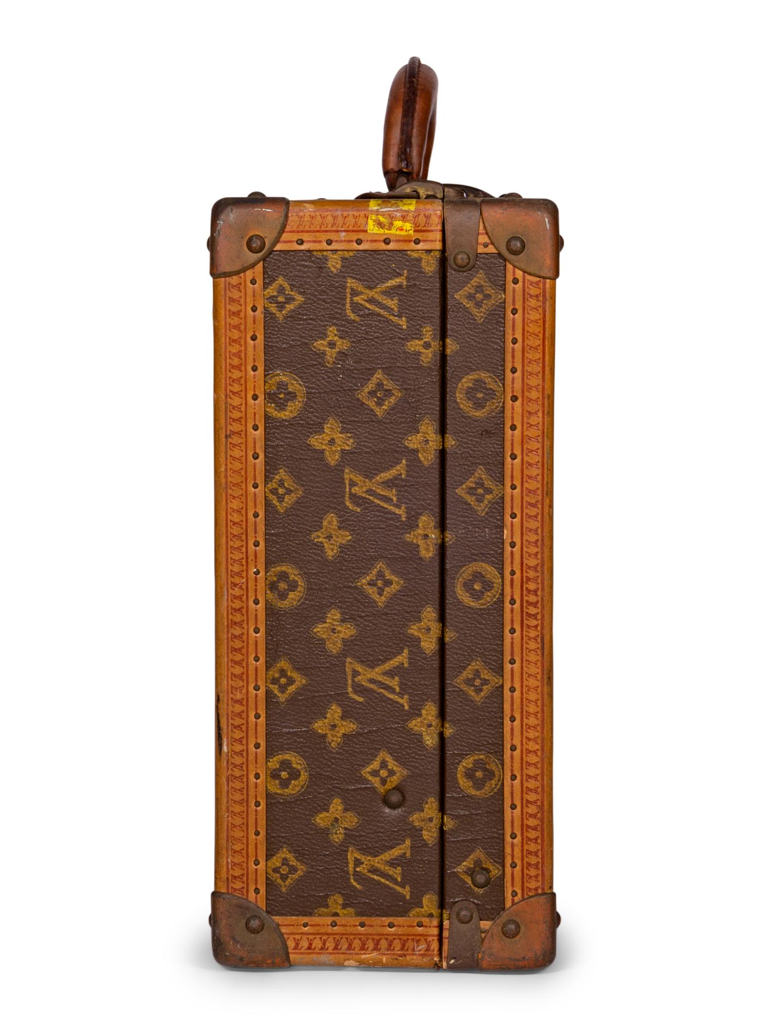 Louis Vuitton Stamped Hardside Suitcase, 1920s