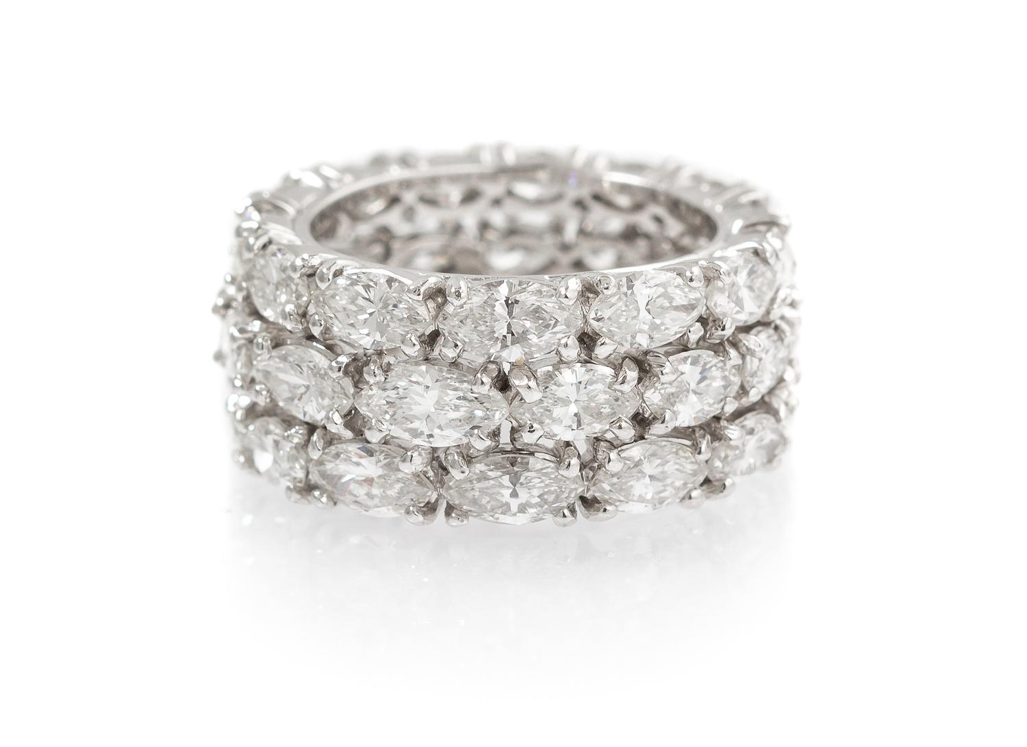 A Platinum and Diamond Eternity Ring, 6.90 dwts.