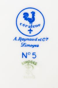 A Raynaud Limoges Porcelain Dinner Service