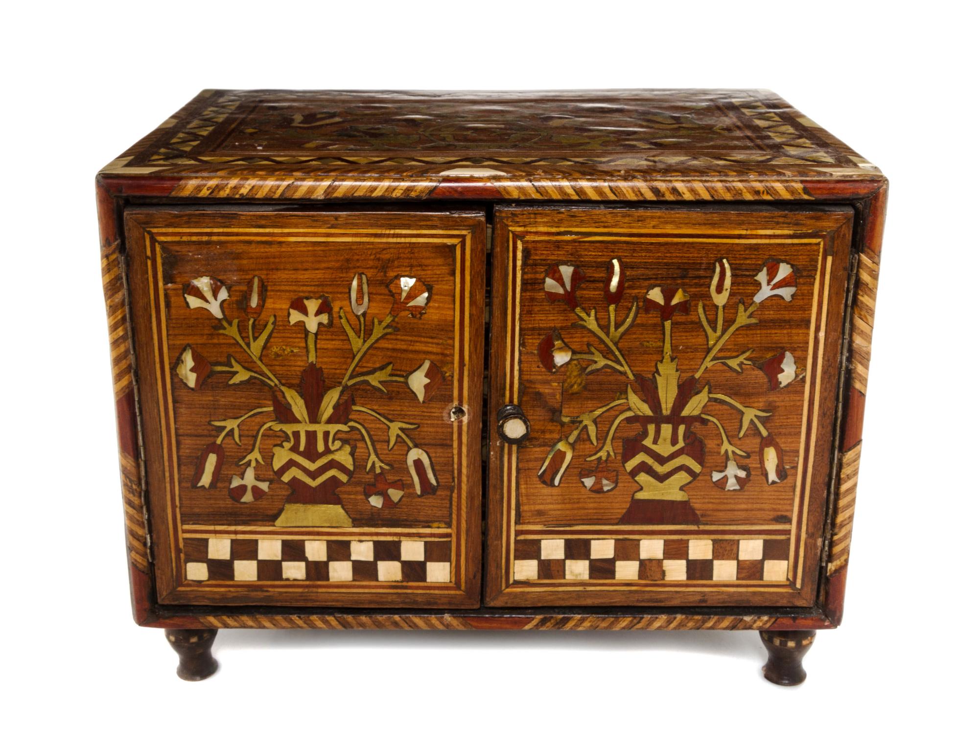A Continental Gilt Metal and Mother-of-Pearl Inlaid Mahogany Jewelry Chest, Height 11 x width 14 1/4 x depth 9 3/4 inches.