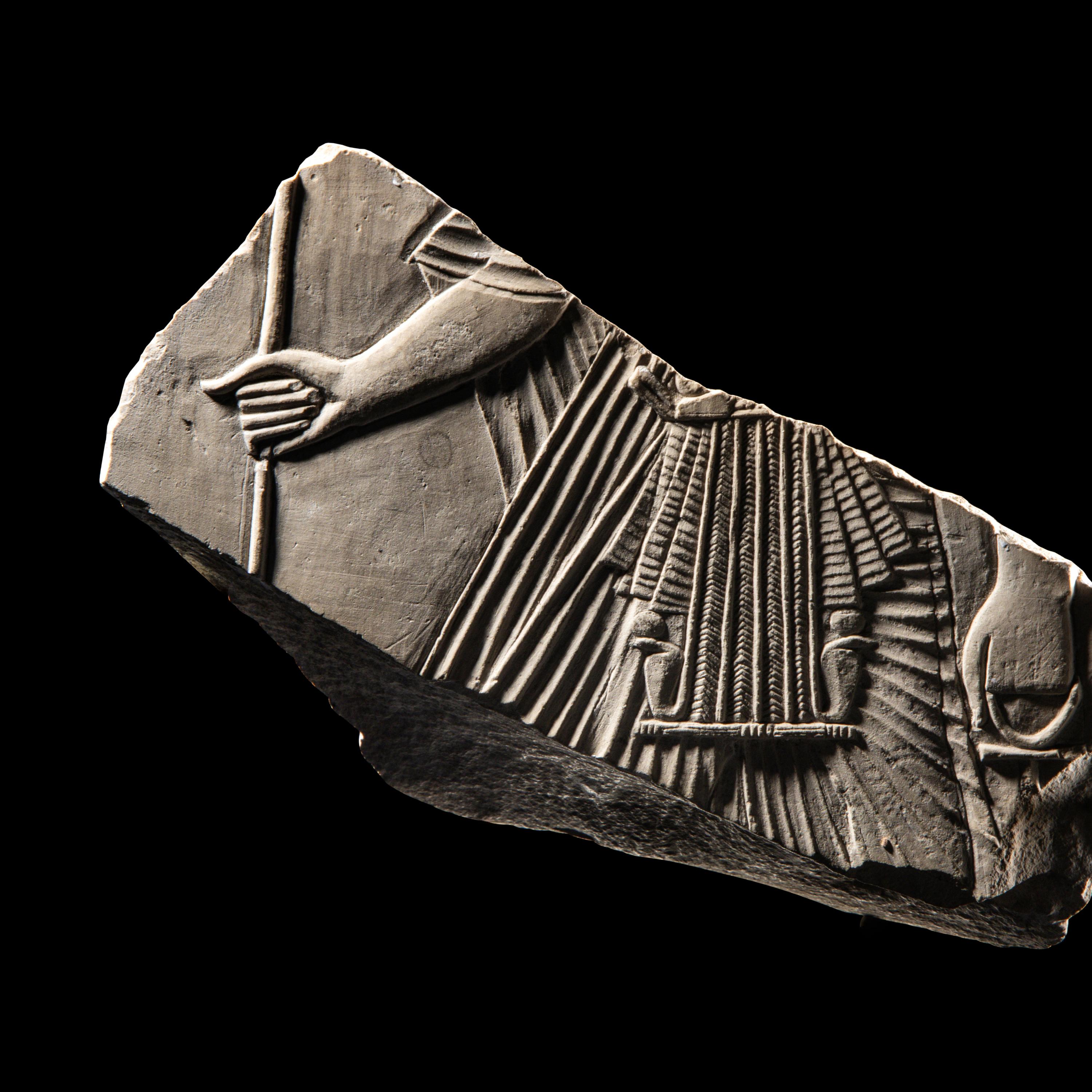 An Egyptian Limestone Relief Fragment with a Pharaoh