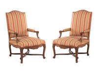 A Pair of Régence Carved Walnut Armchairs