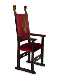 An Italian Baroque Style High Back Arm Chai r