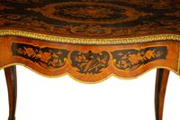 A Napoleon III Style Gilt Bronze Mounted Marquetry Center Table