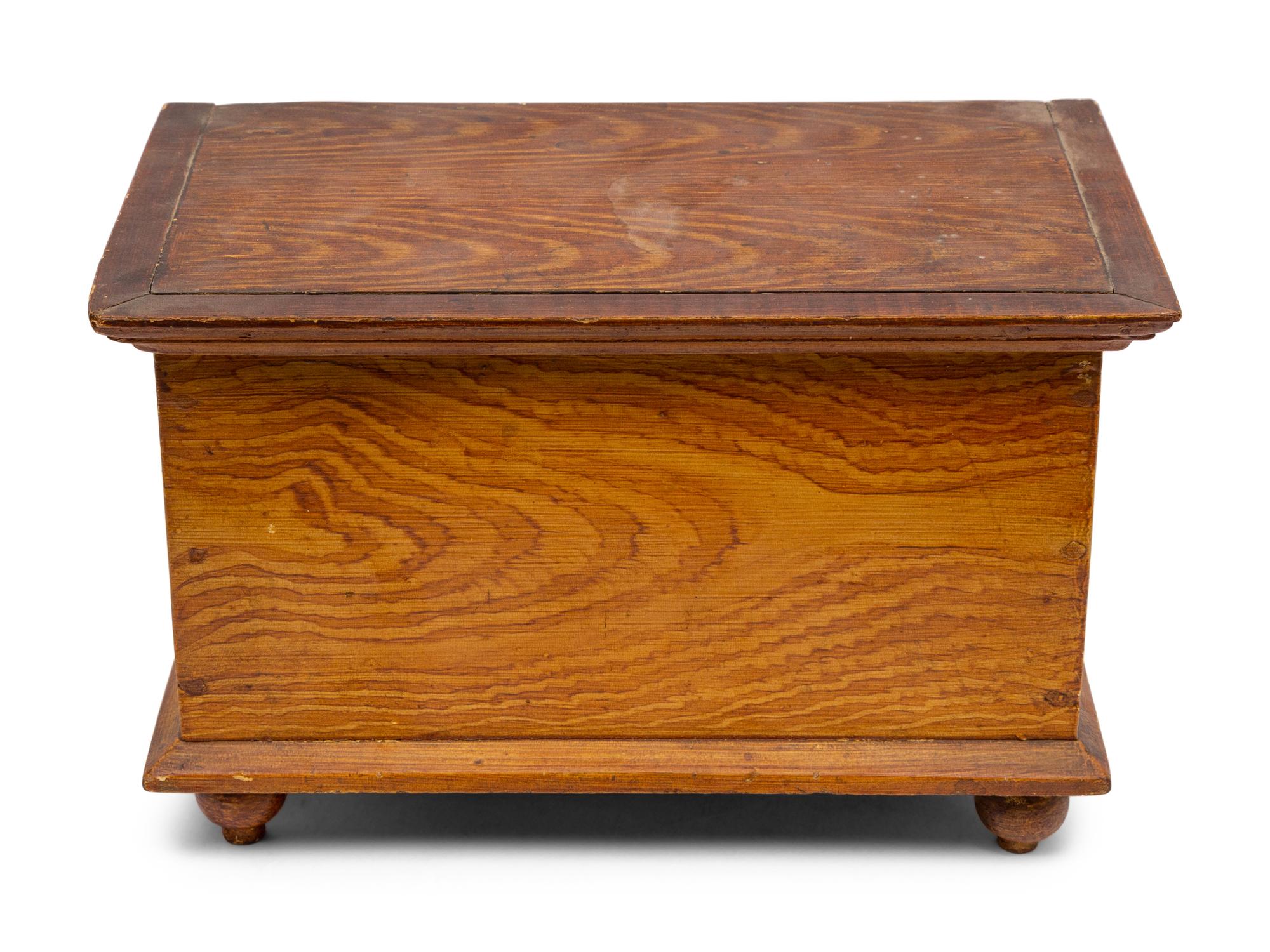 A Miniature Grain Painted Pine Blanket Chest
