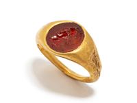 A Roman Gold and Carnelian Finger Ring with the Portrait Head of a Youth, Possibly Phoebus