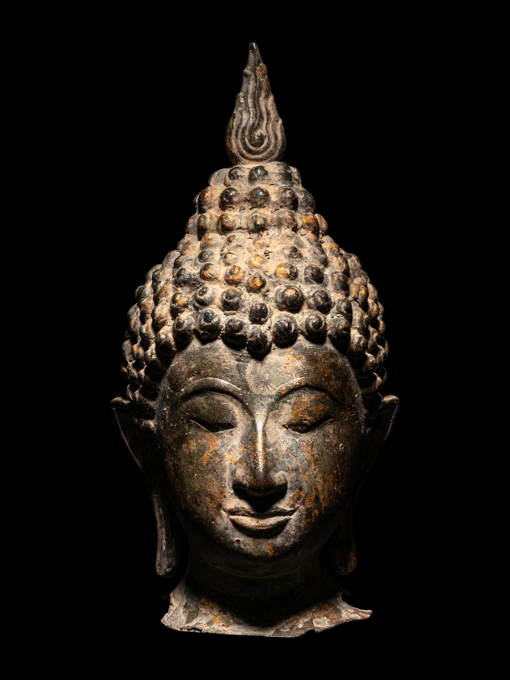 A Bronze Buddha Head