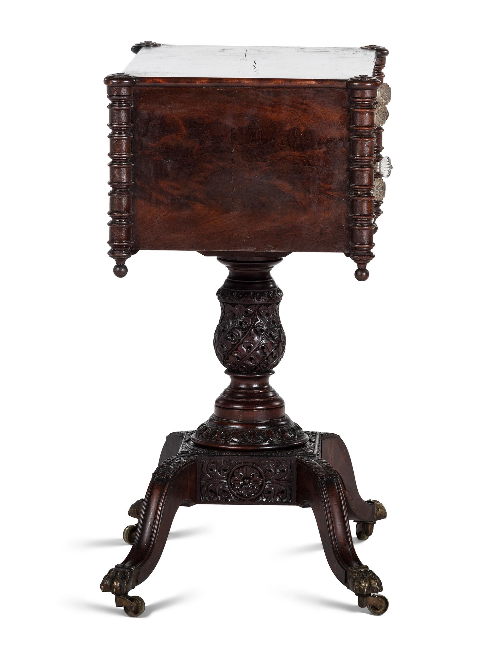 A Classical Carved and Figured Mahogany Pressed Glass Mounted Two-Drawer Work Stand