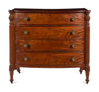 A Federal Carved and Figured Mahogany Bow-Front Chest of Drawers