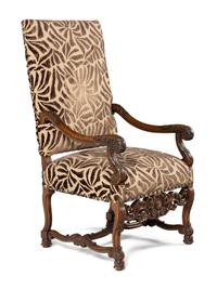 An Italian Rococo Revival Walnut Armchair