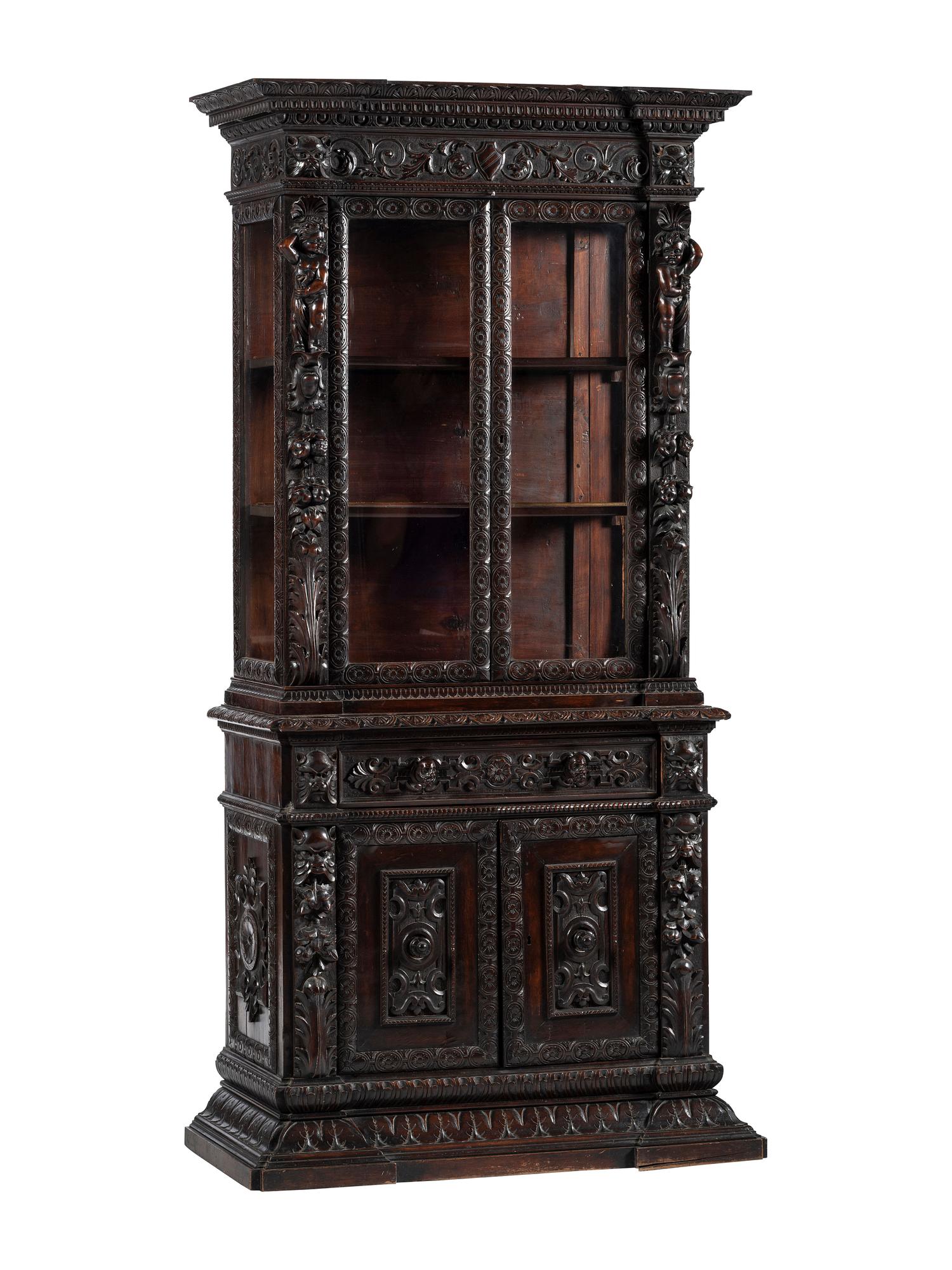 An Italian Renaissance Revival Carved Walnut Bookcase or Vitrine Cabinet
