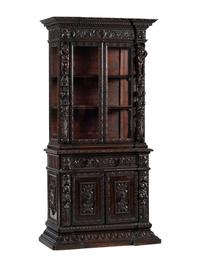 An Italian Renaissance Revival Carved Walnut Bookcase or Vitrine Cabinet