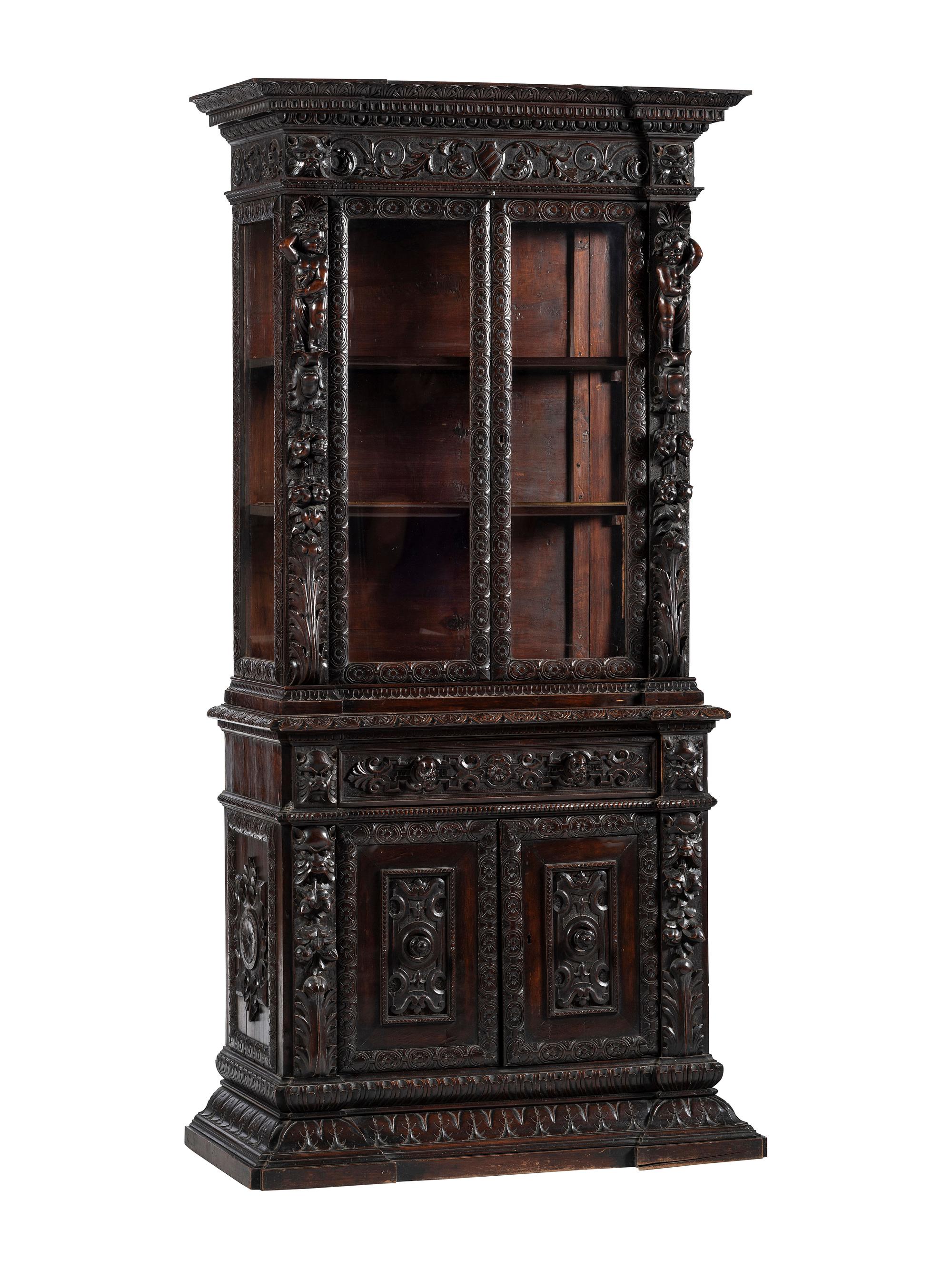 An Italian Renaissance Revival Carved Walnut Bookcase or Vitrine Cabinet