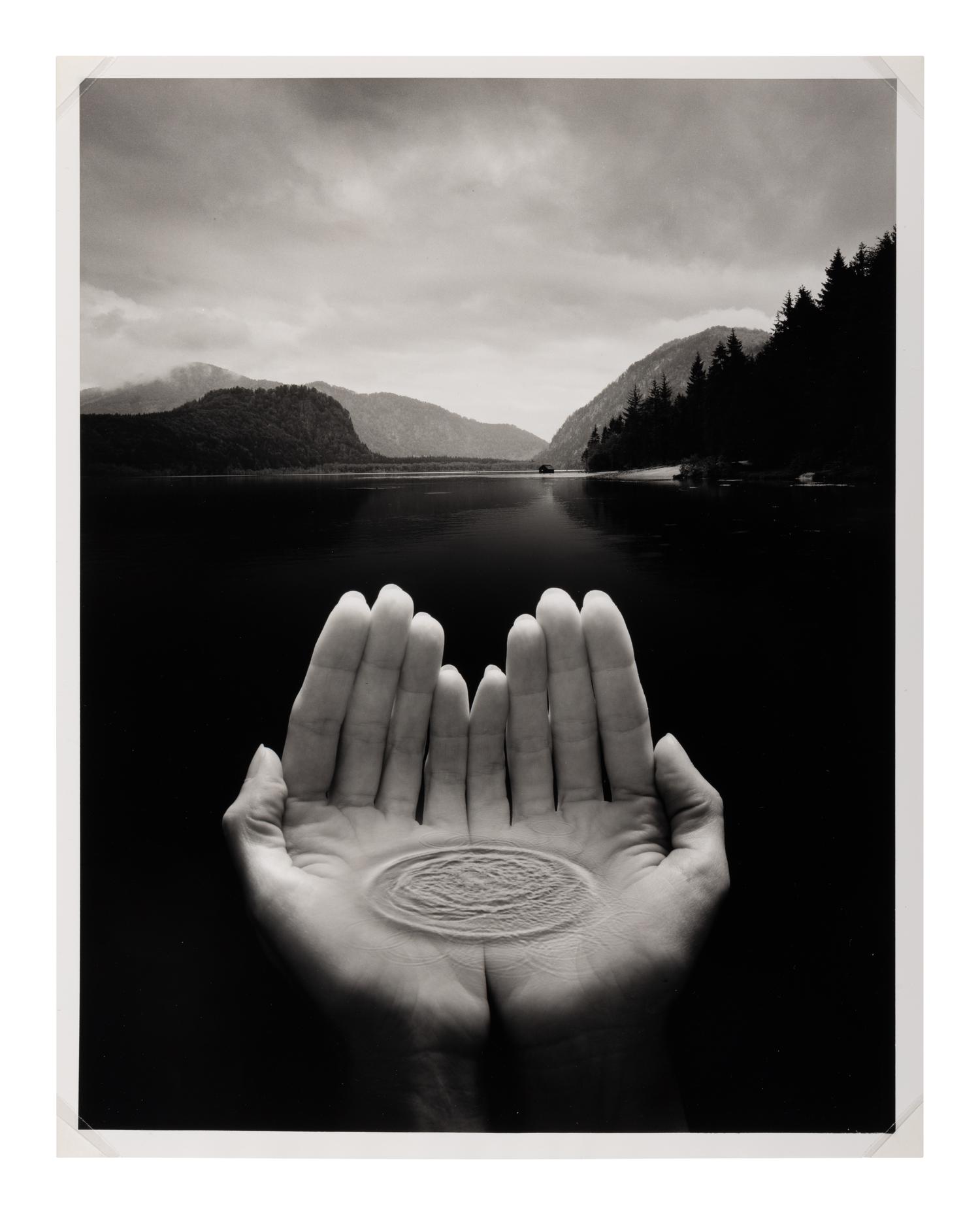 Jerry Uelsmann (1934-2022) Untitled (Hands holding water), 2002