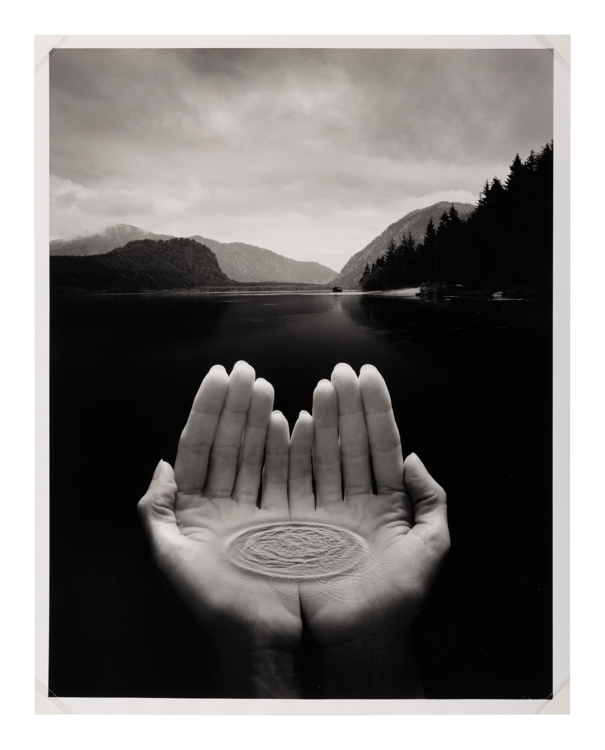 Jerry Uelsmann (1934-2022) Untitled (Hands holding water), 2002