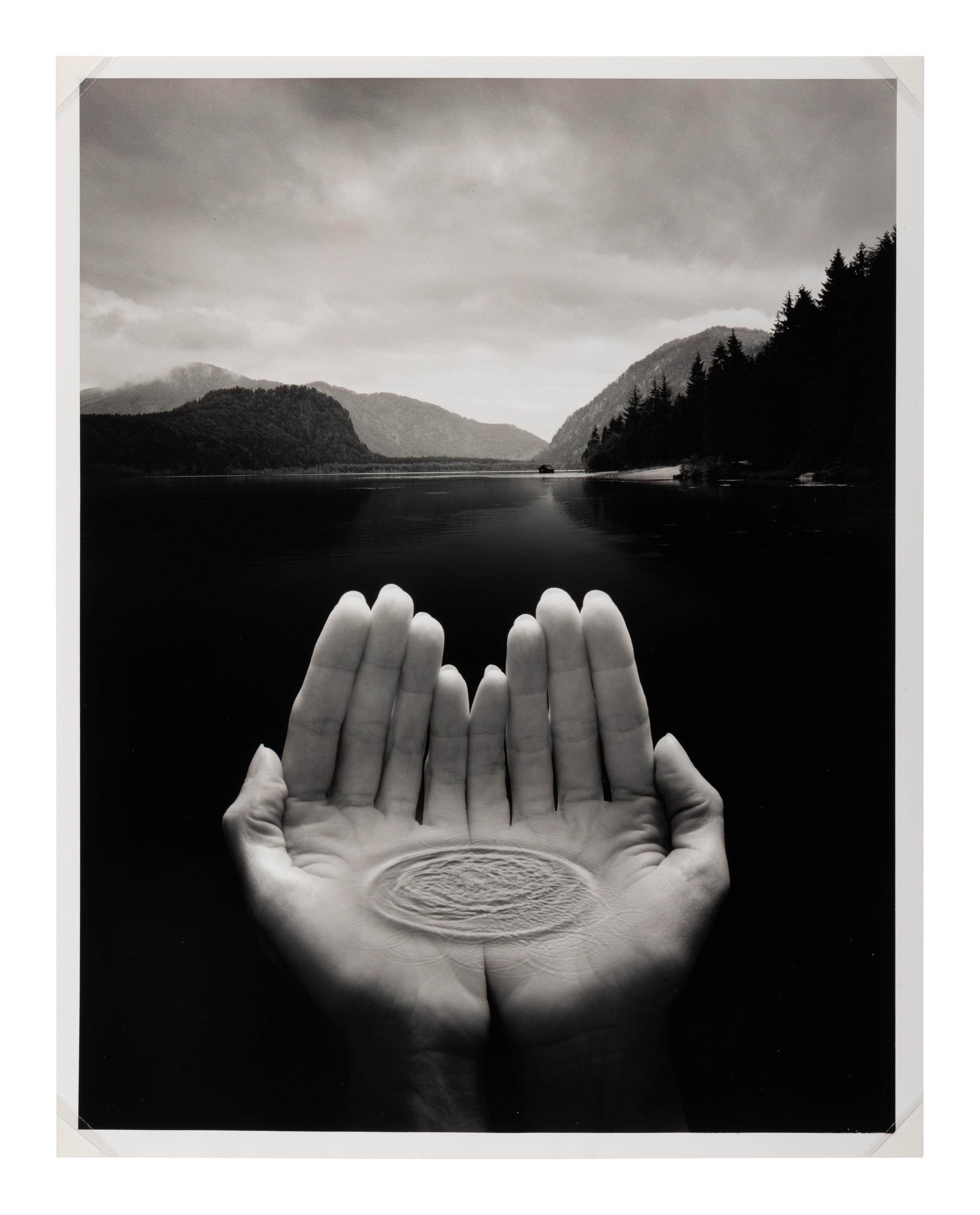 Jerry Uelsmann (1934-2022) Untitled (Hands holding water), 2002