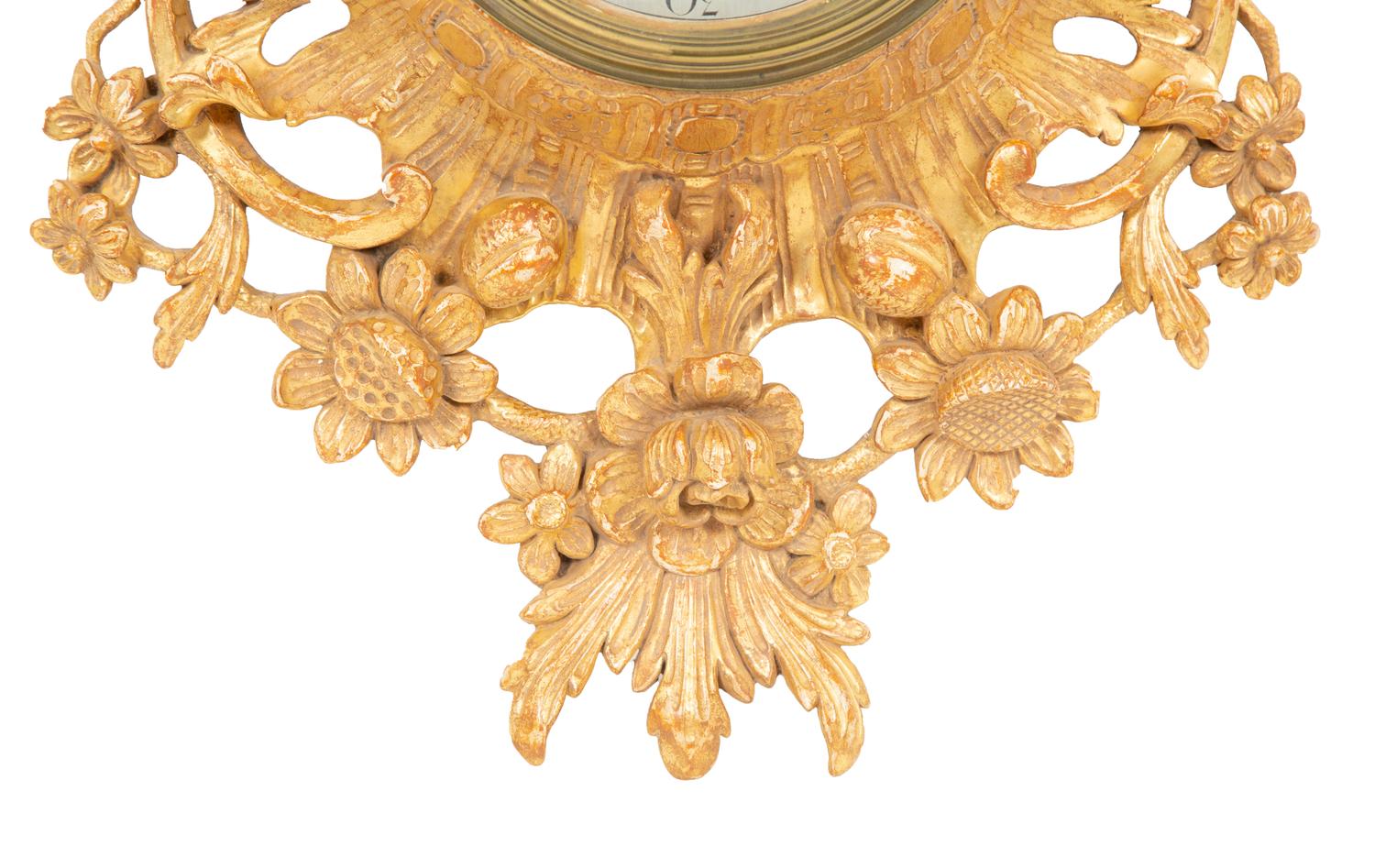 A George III Carved Giltwood Cartel Clock