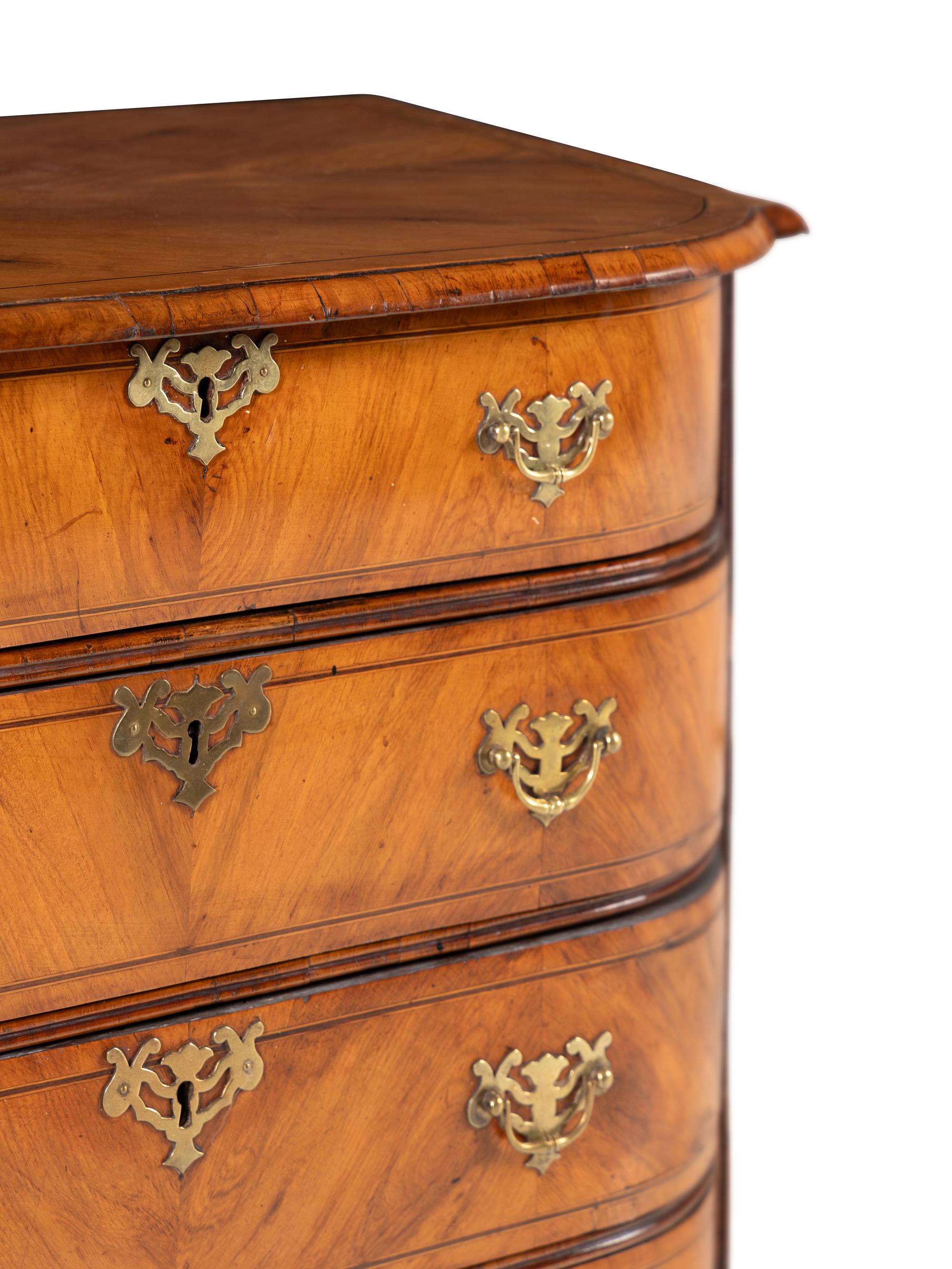 A George III Bookmatch-Veneered Bowfront Chest of Drawers