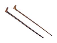 Two English Carved Wood Shoe-Form Canes