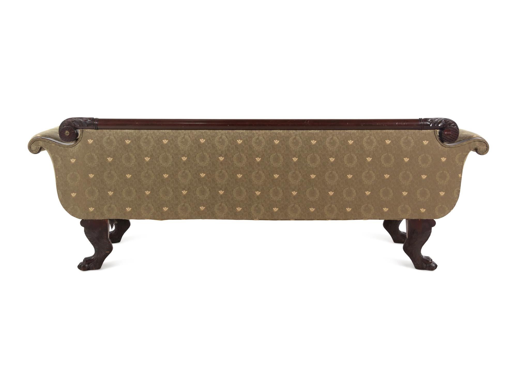 A Classical Carved Mahogany Sofa