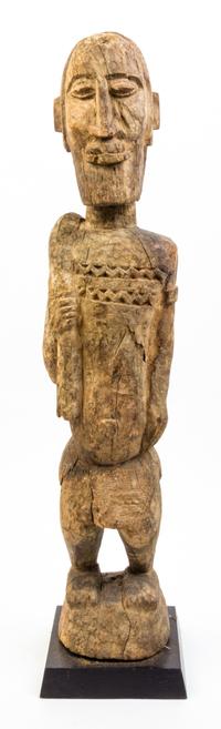 A Carved Wood Figure Height of figure overall 32 inches.