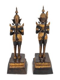 A Pair of Thai Parcel Gilt and Patinated Bronze Mythical Figures