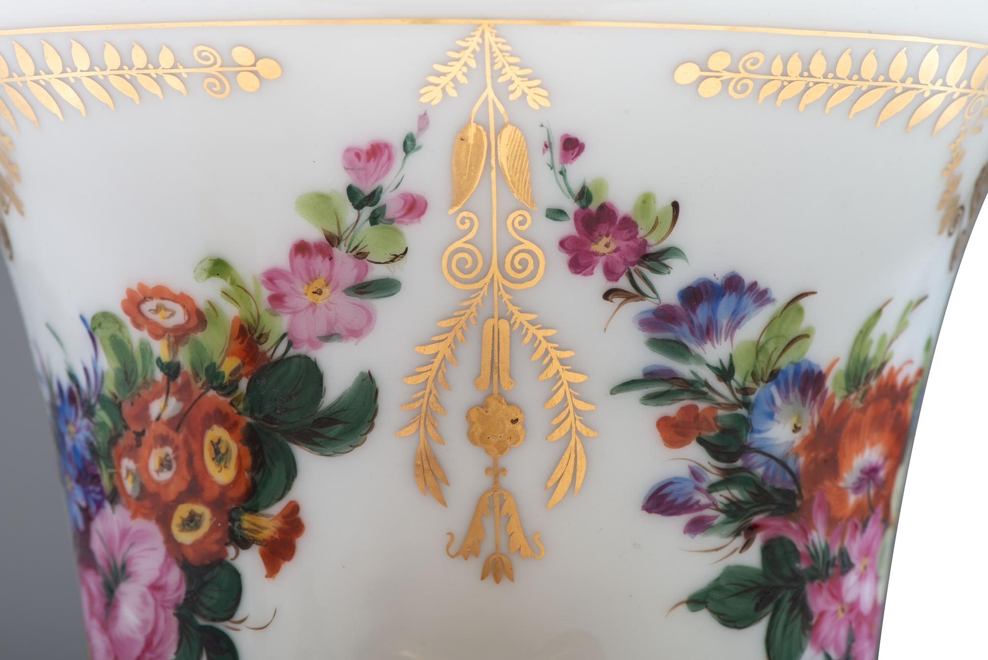 A Pair of Parcel Gilt and Polychrome Decorated Porcelain Vases