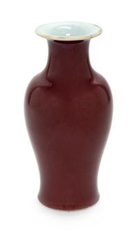 A Chinese Sang-de-Boeuf Glazed Porcelain Vase Height 9 1/2 inches. — LATE 19TH/EARLY 20TH CENTURY
