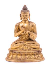 A Sino-Tibetan Gilt Bronze Seated Figure of Buddha Shakyamuni