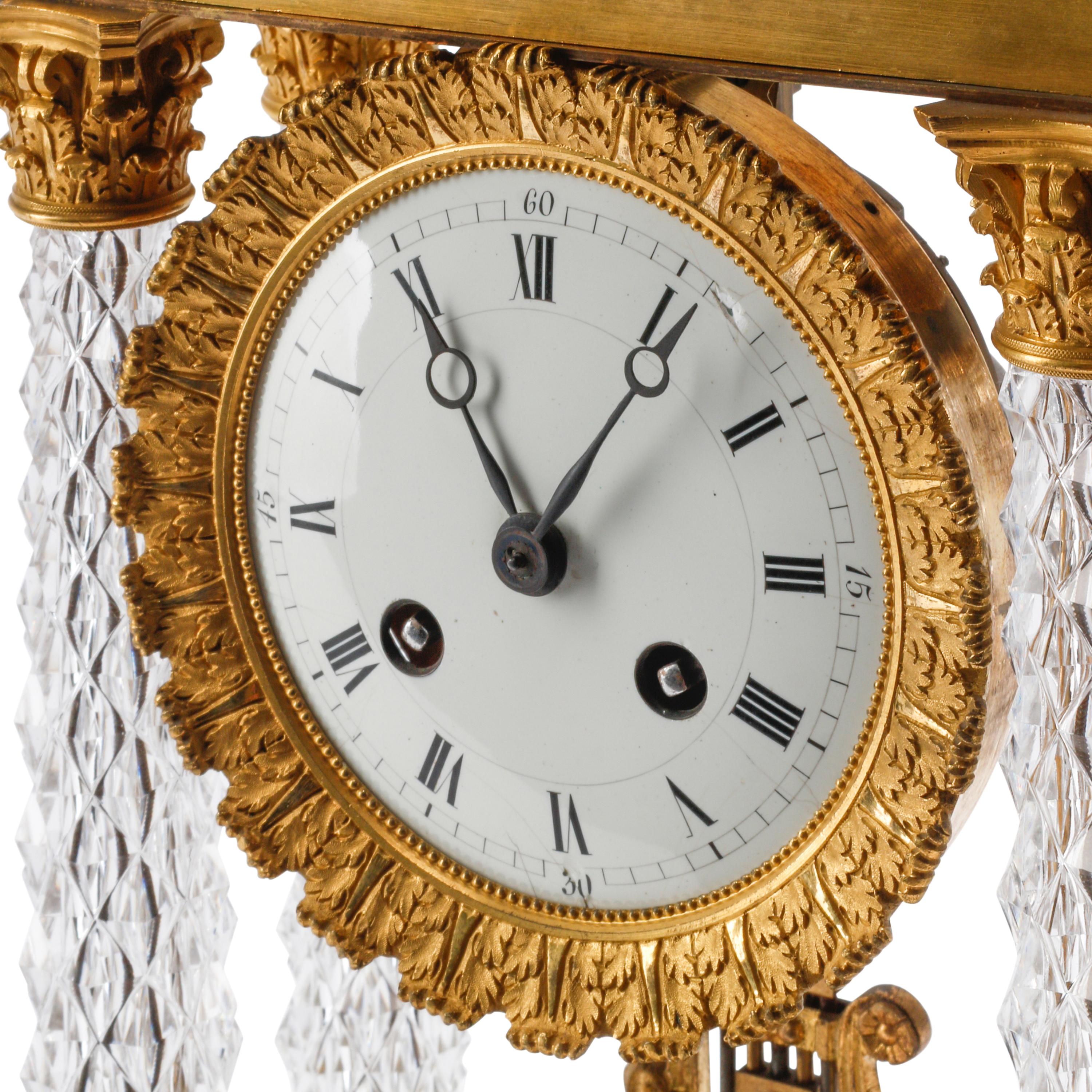 A Charles X Gilt Bronze and Cut Glass Mantel Clock
