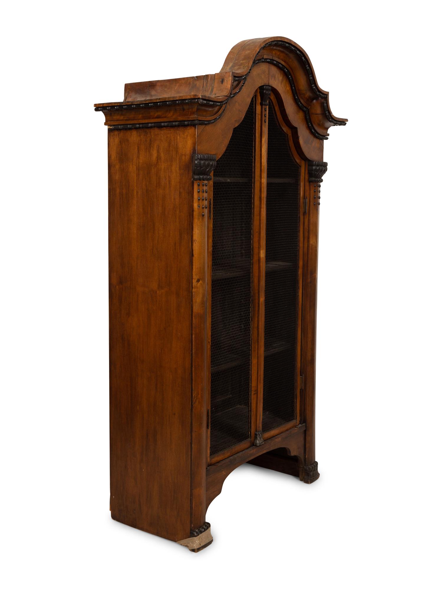 A Pair of Biedermeier Part-Ebonized Fruitwood Bookcases