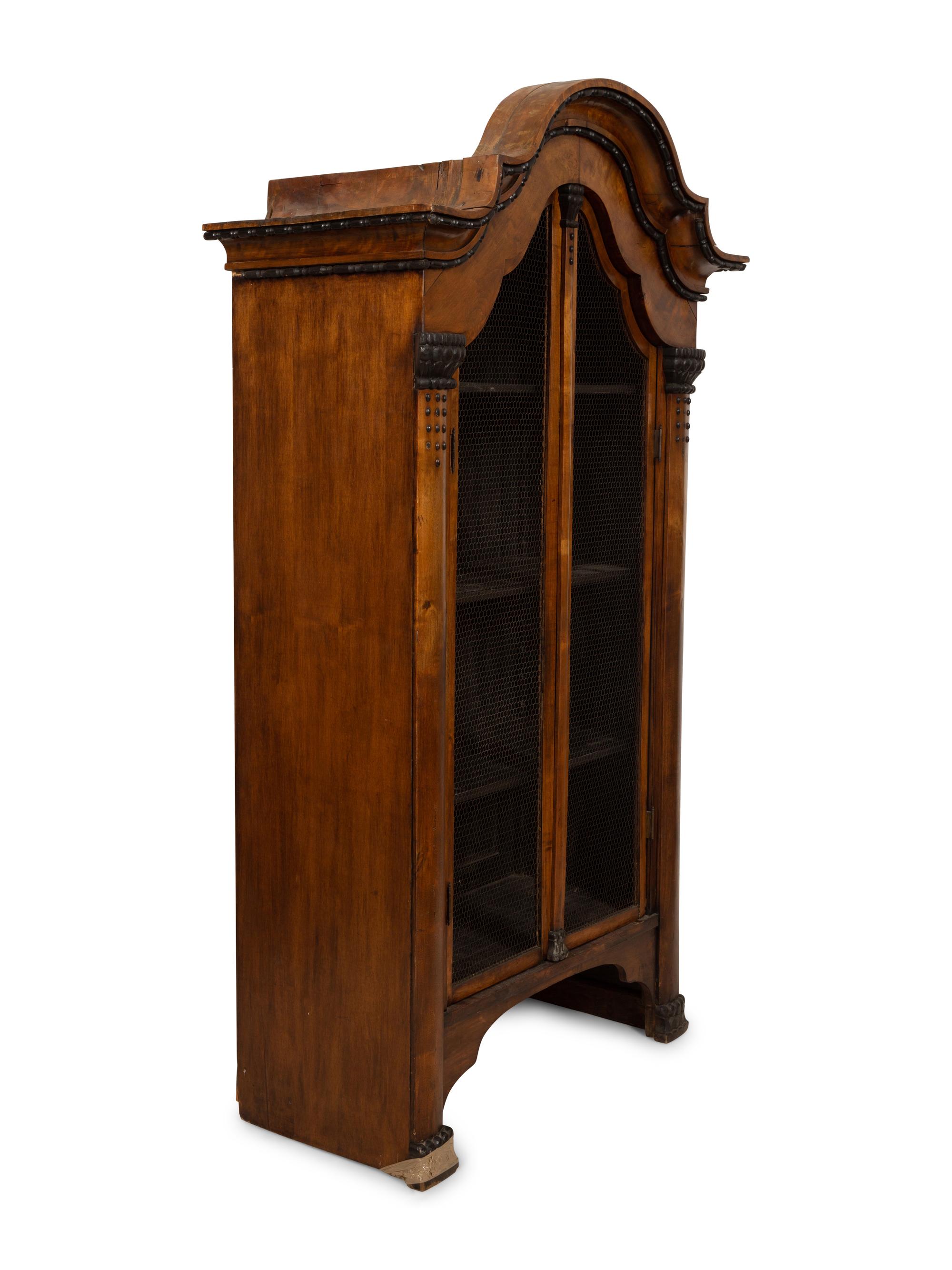A Pair of Biedermeier Part-Ebonized Fruitwood Bookcases