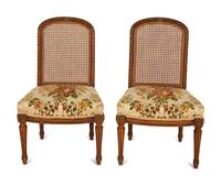 A Pair of Italian Louis XVI Style Gilt Metal Mounted Mahogany and Canework Side Chairs