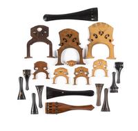 A Group of Stringed Instrument Parts Including Tailpieces and Bridges